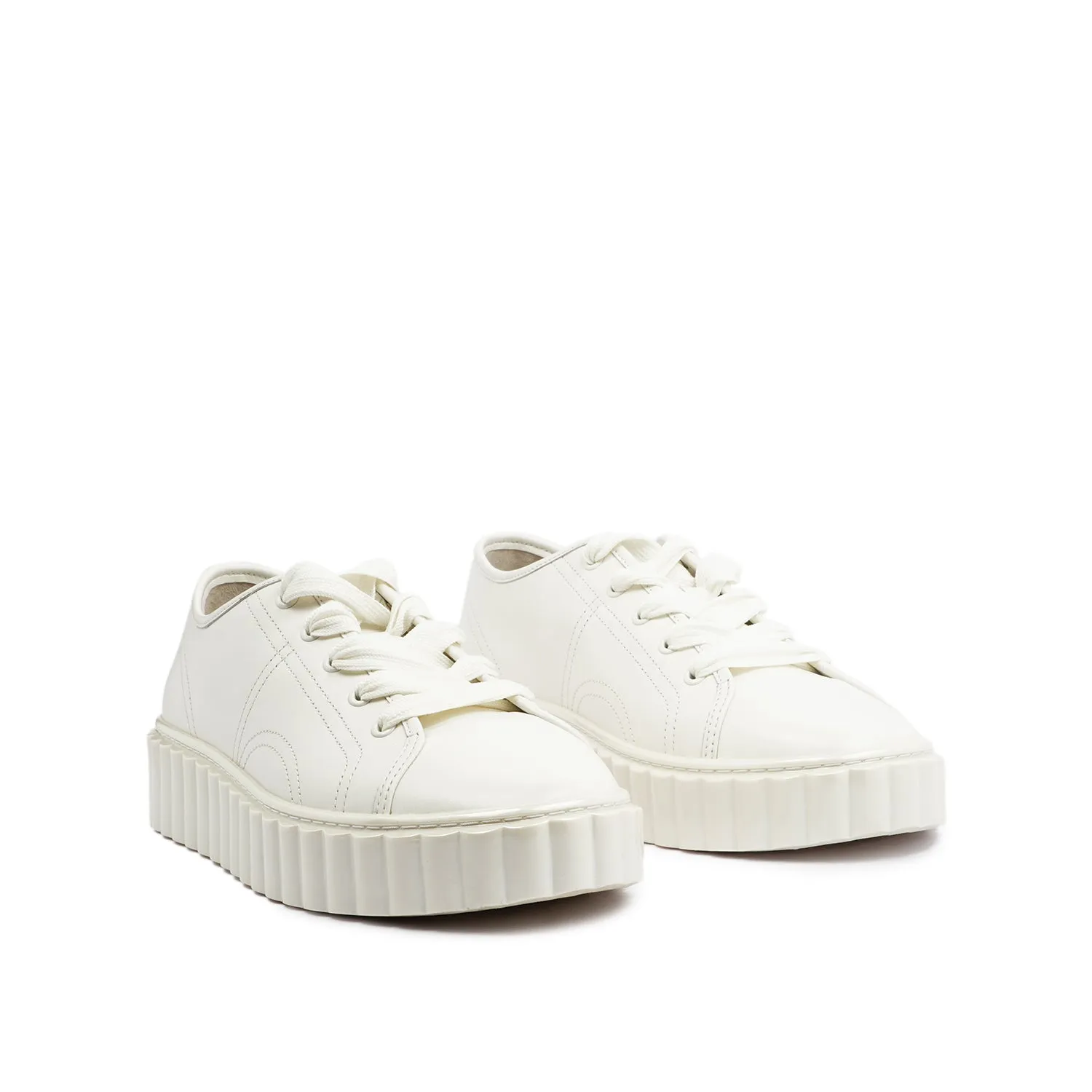 TORY BURCH SCALLOP SNEAKER IN WHITE